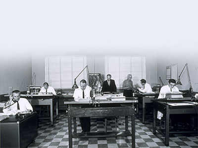 1960 Hunter Engineering staff working side-by-side