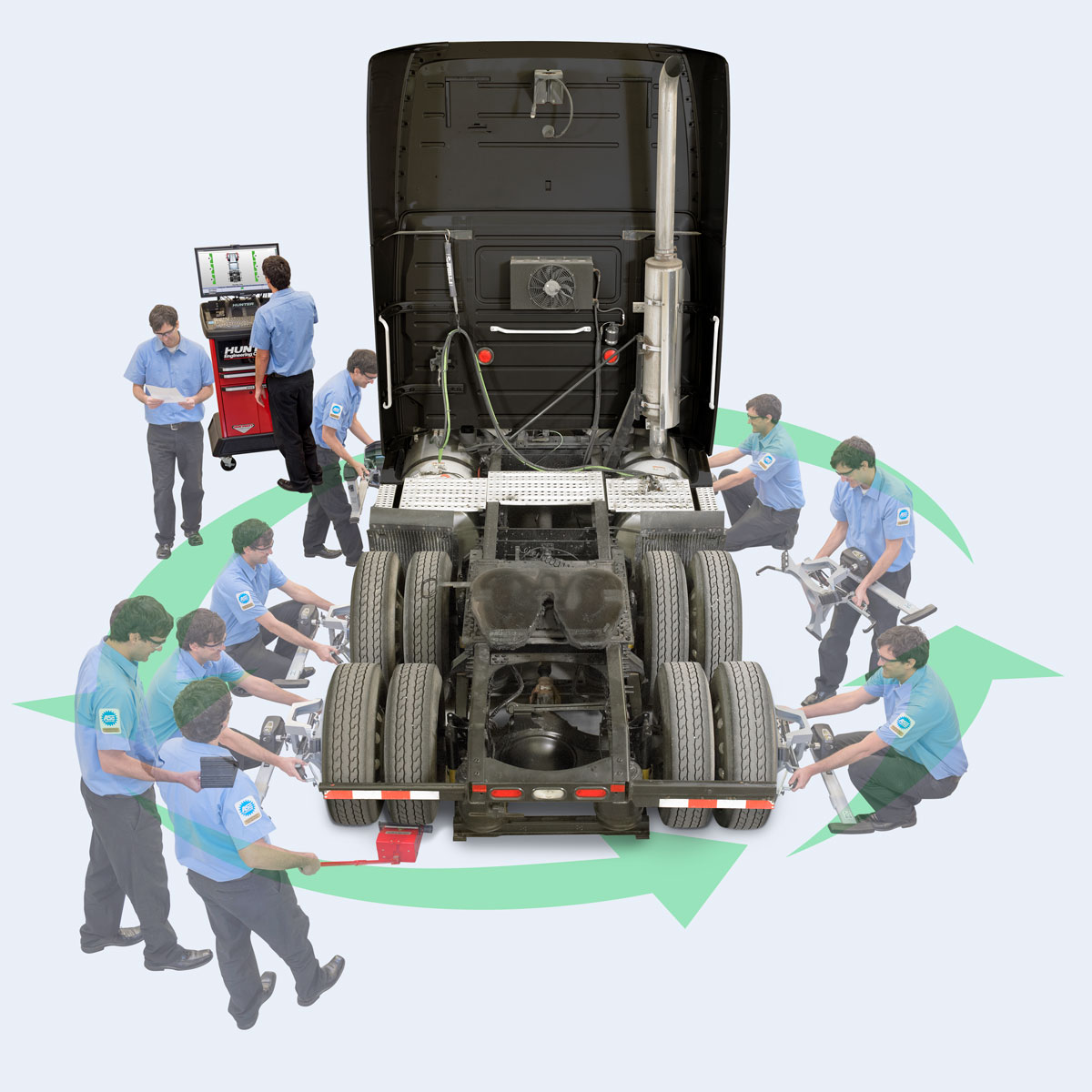 Truck with open hood surrounded by technicians performing wheel alignment time trials.